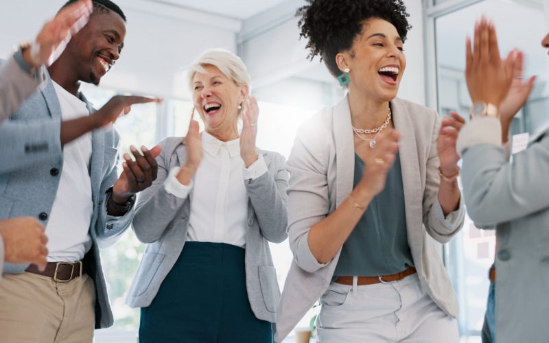 High five, team and support with business people and success, celebrate winning and solidarity with teamwork. Diversity, celebration and collaboration with happy employee group, applause and winner